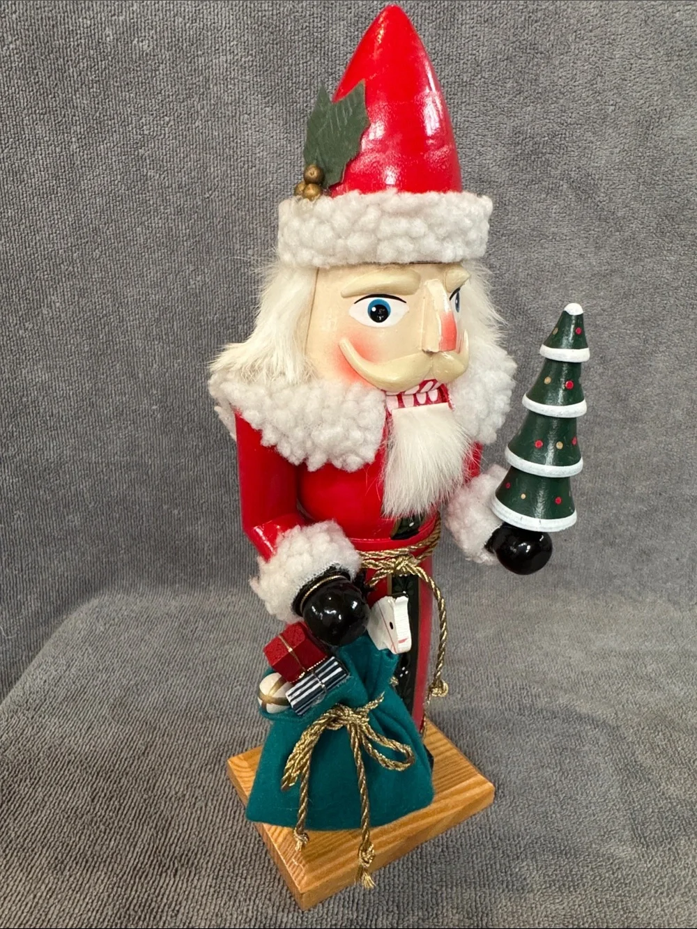 1990s 13.75 inch Santa Nutcracker with Green Tree and Sack of Toys Holiday Decor
